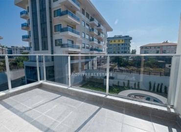 Апартаменты 1+1, 54м², с дизайнерским интерьером в премиум-комплексе в 100м от моря в районе Каргыджак, Алания ID-19266 фото-7