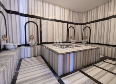 Апартаменты 1+1, 54м², с дизайнерским интерьером в премиум-комплексе в 100м от моря в районе Каргыджак, Алания ID-19266 фото-16