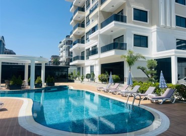 Апартаменты 1+1, 54м², с дизайнерским интерьером в премиум-комплексе в 100м от моря в районе Каргыджак, Алания ID-19266 фото-17