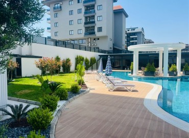 Апартаменты 1+1, 54м², с дизайнерским интерьером в премиум-комплексе в 100м от моря в районе Каргыджак, Алания ID-19266 фото-21