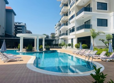 Апартаменты 1+1, 54м², с дизайнерским интерьером в премиум-комплексе в 100м от моря в районе Каргыджак, Алания ID-19266 фото-22
