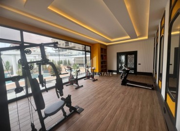 Апартаменты 1+1, 54м², с дизайнерским интерьером в премиум-комплексе в 100м от моря в районе Каргыджак, Алания ID-19266 фото-23