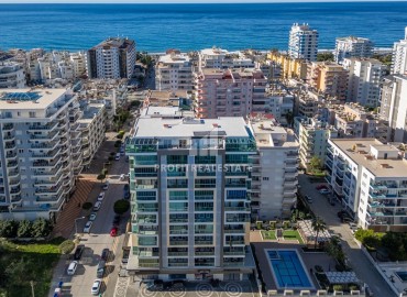 Готовая к проживанию, квартира с одной спальней, 55м², в комплексе премиум класса в 300м от моря в Махмутларе, Алания ID-19382 фото-1
