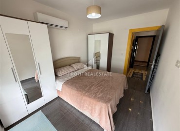 Готовая к проживанию, квартира с одной спальней, 55м², в комплексе премиум класса в 300м от моря в Махмутларе, Алания ID-19382 фото-8