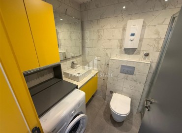 Готовая к проживанию, квартира с одной спальней, 55м², в комплексе премиум класса в 300м от моря в Махмутларе, Алания ID-19382 фото-9