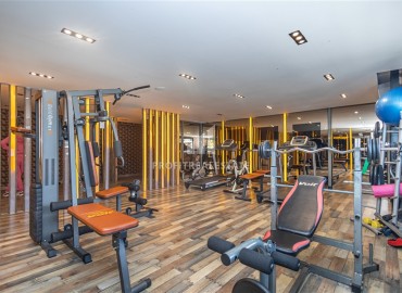 Готовая к проживанию, квартира с одной спальней, 55м², в комплексе премиум класса в 300м от моря в Махмутларе, Алания ID-19382 фото-17