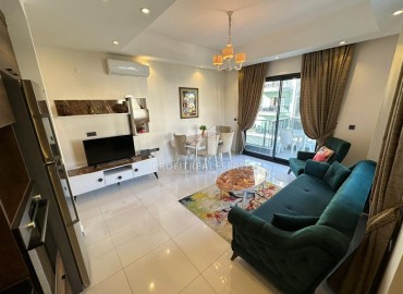Уютная двухкомнатная квартира, 53м², в элитном комплексе с отличной локацией в 500м от моря в Махмутларе, Алания ID-19384 фото-4