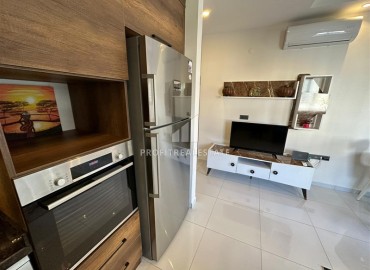 Уютная двухкомнатная квартира, 53м², в элитном комплексе с отличной локацией в 500м от моря в Махмутларе, Алания ID-19384 фото-9