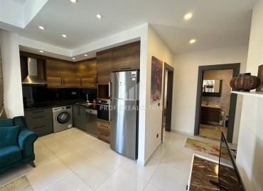 Уютная двухкомнатная квартира, 53м², в элитном комплексе с отличной локацией в 500м от моря в Махмутларе, Алания ID-19384 фото-10