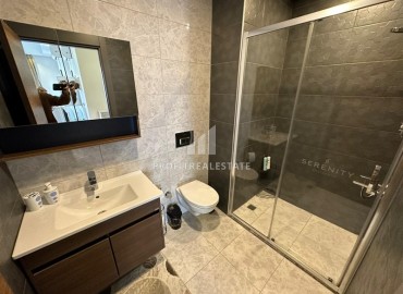 Уютная двухкомнатная квартира, 53м², в элитном комплексе с отличной локацией в 500м от моря в Махмутларе, Алания ID-19384 фото-15