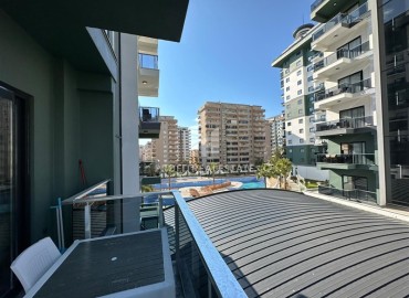 Уютная двухкомнатная квартира, 53м², в элитном комплексе с отличной локацией в 500м от моря в Махмутларе, Алания ID-19384 фото-21