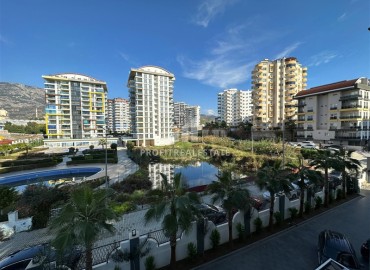 Уютная двухкомнатная квартира, 53м², в элитном комплексе с отличной локацией в 500м от моря в Махмутларе, Алания ID-19384 фото-24