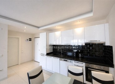 Уютная двухкомнатная квартира, 65м², в комплексе премиум класса в 100м от моря в районе Кестель, Алания ID-19394 фото-4