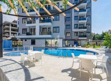 Меблированные апартаменты с двумя спальнями и отдельной кухней, 95м², в комфортабельном комплексе в центре Алании ID-19397 фото-1