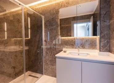 Фешенебельный дуплекс 3+1, 145м², с личным садом 90м² в элитном комплексе в Каргыджаке, Алания ID-19399 фото-10