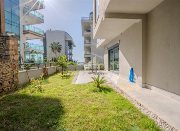 Фешенебельный дуплекс 3+1, 145м², с личным садом 90м² в элитном комплексе в Каргыджаке, Алания ID-19399 фото-15