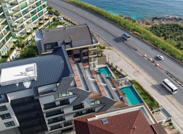 Фешенебельный дуплекс 3+1, 145м², с личным садом 90м² в элитном комплексе в Каргыджаке, Алания ID-19399 фото-16
