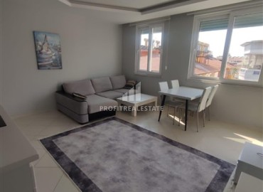 Двухкомнатная квартира с симпатичным интерьером, 50м², в резиденции с зимним бассейном в 150м от моря в районе Оба, Алания ID-19403 фото-4