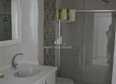 Двухкомнатная квартира с симпатичным интерьером, 50м², в резиденции с зимним бассейном в 150м от моря в районе Оба, Алания ID-19403 фото-7