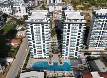 Комфортабельная двухкомнатная квартира, 60м², в новом элитном комплексе в 450м от моря, в Махмутларе, Алания ID-19409 фото-1