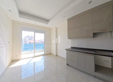 Комфортабельная двухкомнатная квартира, 60м², в новом элитном комплексе в 450м от моря, в Махмутларе, Алания ID-19409 фото-2
