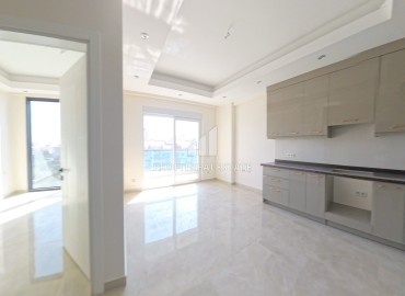Комфортабельная двухкомнатная квартира, 60м², в новом элитном комплексе в 450м от моря, в Махмутларе, Алания ID-19409 фото-3