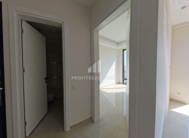 Комфортабельная двухкомнатная квартира, 60м², в новом элитном комплексе в 450м от моря, в Махмутларе, Алания ID-19409 фото-4