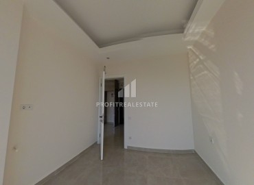 Комфортабельная двухкомнатная квартира, 60м², в новом элитном комплексе в 450м от моря, в Махмутларе, Алания ID-19409 фото-5