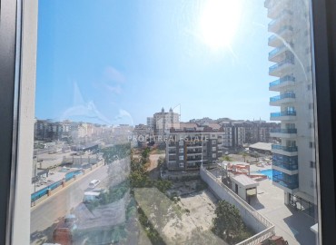 Комфортабельная двухкомнатная квартира, 60м², в новом элитном комплексе в 450м от моря, в Махмутларе, Алания ID-19409 фото-7