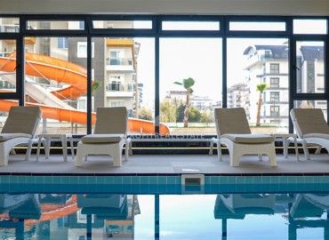 Комфортабельная двухкомнатная квартира, 60м², в новом элитном комплексе в 450м от моря, в Махмутларе, Алания ID-19409 фото-10