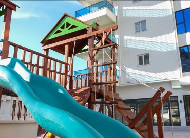 Комфортабельная двухкомнатная квартира, 60м², в новом элитном комплексе в 450м от моря, в Махмутларе, Алания ID-19409 фото-15