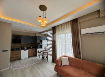 Апартаменты с одной спальней, 55м², с элегантным интерьером в комплексе премиум класса в Махмутларе, Алания ID-19411 фото-4