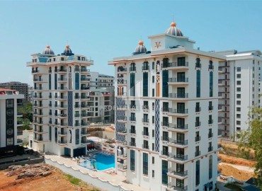 Двухкомнатная квартира, 57м², с чистовой отделкой в современном комплексе премиум класса в Махмутларе, Алания ID-19418 фото-1