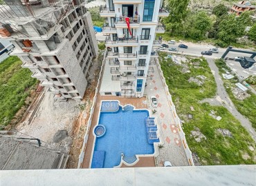 Двухкомнатная квартира, 57м², с чистовой отделкой в современном комплексе премиум класса в Махмутларе, Алания ID-19418 фото-10