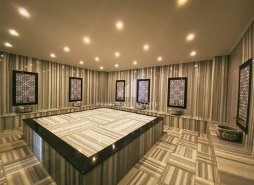 Двухкомнатная квартира, 57м², с чистовой отделкой в современном комплексе премиум класса в Махмутларе, Алания ID-19418 фото-16