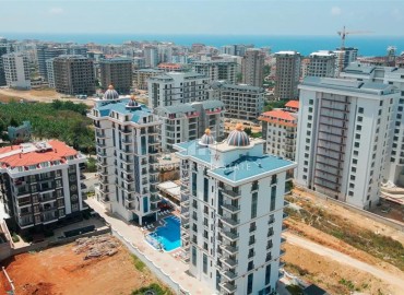 Двухкомнатная квартира, 57м², с чистовой отделкой в современном комплексе премиум класса в Махмутларе, Алания ID-19418 фото-17