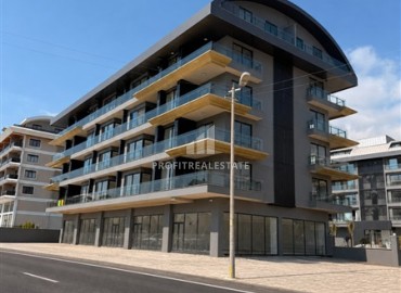 Элегантные двухкомнатные апартаменты, 65м², в комплексе премиум класса в Каргыджаке, в 200м от моря, Алания ID-19419 фото-1