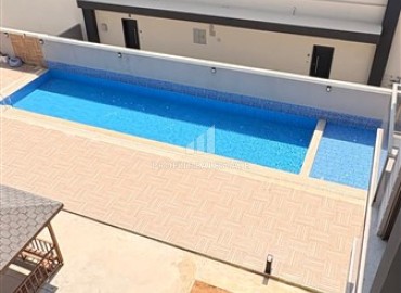 Двухкомнатная квартира, 55м², в новом комплексе с бассейном в районе Анталии - Аксу, Алтынташ ID-19421 фото-9
