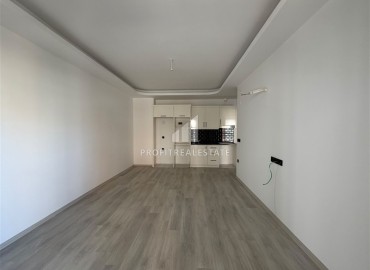Апартаменты с одной спальней, 50м², с чистовой отделкой в комплексе премиум класса на центральной улице Махмутлара, Алания ID-19422 фото-2