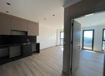 Видовая двухкомнатная квартира, 71м², на высоком этаже в новом элитном комплексе у подножия гор в районе Кестель, Алания ID-19423 фото-4