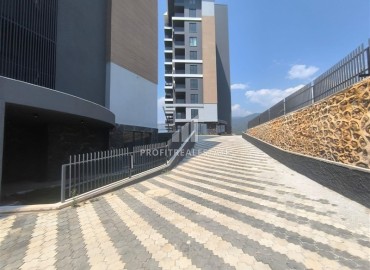 Видовая двухкомнатная квартира, 71м², на высоком этаже в новом элитном комплексе у подножия гор в районе Кестель, Алания ID-19423 фото-27