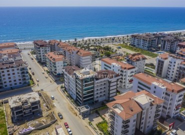Трехкомнатная квартира с интерьером от дизайнера, 115м², в 150м от моря в районе Кестель, Алания ID-19425 фото-1
