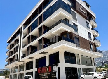 Апартаменты с одной спальней, 55м², в комфортабельном комплексе с инфраструктурой в Махмутларе, Алания ID-19429 фото-1