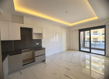 Апартаменты с одной спальней, 55м², в комфортабельном комплексе с инфраструктурой в Махмутларе, Алания ID-19429 фото-4