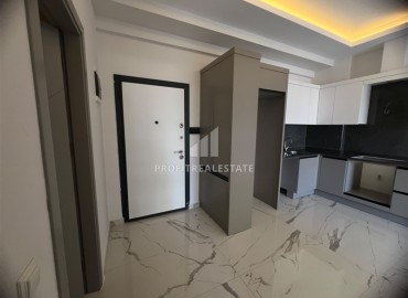 Апартаменты с одной спальней, 55м², в комфортабельном комплексе с инфраструктурой в Махмутларе, Алания ID-19429 фото-6