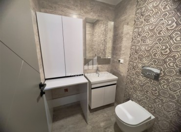 Апартаменты с одной спальней, 55м², в комфортабельном комплексе с инфраструктурой в Махмутларе, Алания ID-19429 фото-9