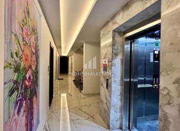 Апартаменты с одной спальней, 55м², в комфортабельном комплексе с инфраструктурой в Махмутларе, Алания ID-19429 фото-20