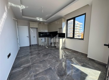 Трехкомнатная квартира с чистовой отделкой, 80м², в новой резиденции на центральной улице Махмутлара, Алания ID-19430 фото-2