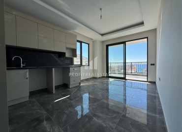 Трехкомнатная квартира с чистовой отделкой, 80м², в новой резиденции на центральной улице Махмутлара, Алания ID-19430 фото-3