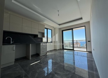 Трехкомнатная квартира с чистовой отделкой, 80м², в новой резиденции на центральной улице Махмутлара, Алания ID-19430 фото-5
